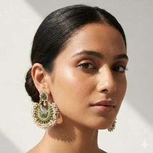 Gold tone chandbali statement earrings with emerald green stones & pearls
